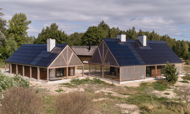 two houses with solar rooftops