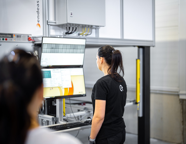 Solarstone factory employee using a new testing station