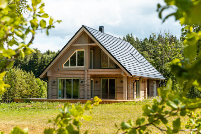 Solarstone Solar Tiled Roof on a wooden house in a forest