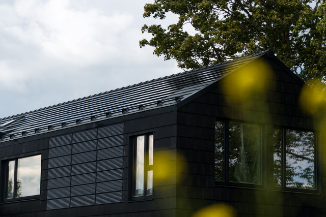 solarstone solar tiled roof on roof and facade