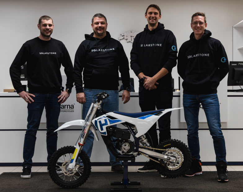 solarstone team and a motorcycle