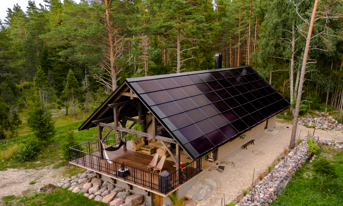 solarstone solar full roof solar panels in pine forest