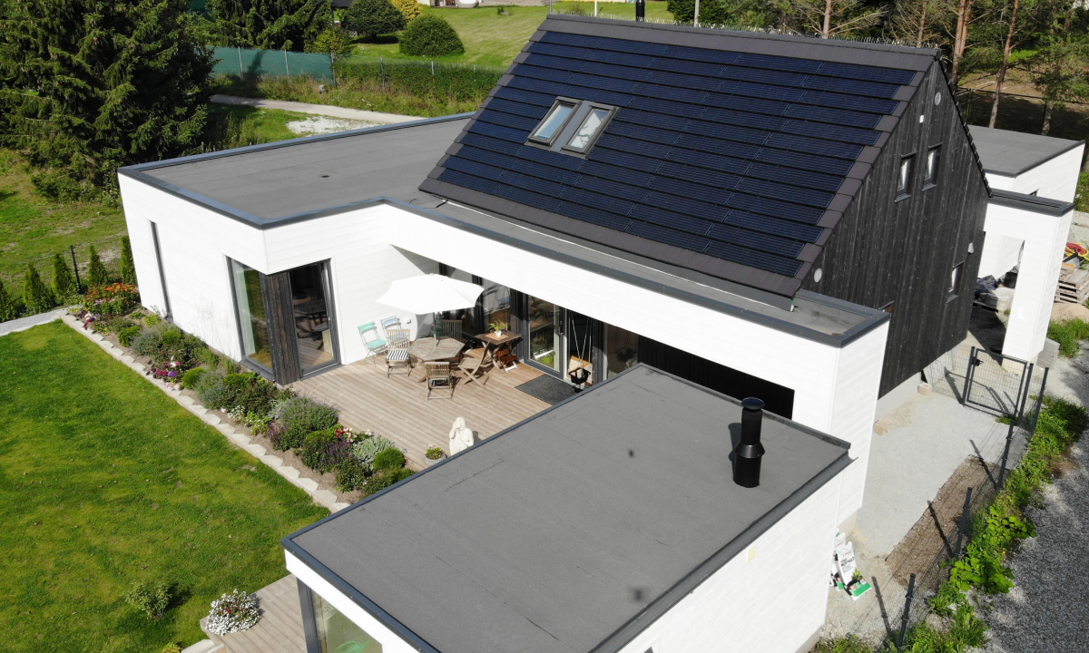 solarstone solar tiled roof on a house with black roof tiles